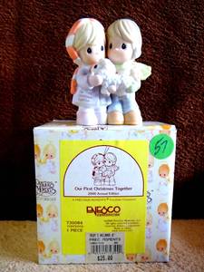 lot 57 image: Precious Moments 730084 Our First Christmas Together Ornament 2000 - ENESCO
