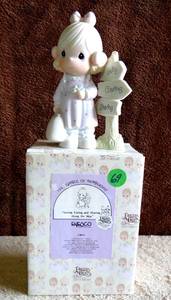 lot 69 image: Precious Moments C0013 Loving, Caring and Sharing Along the Way 1993