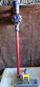 lot 143 image: Dyson V6 Absolute Cordless Stick Vacuum Cleaner, Red $$$
