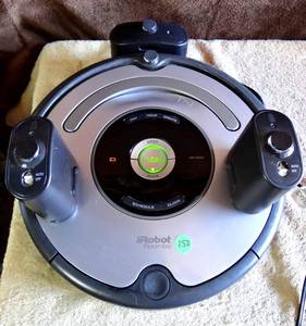 lot 150 image: IROBOT ROOMBA ROBOTIC VACUUM CLEANER MODEL 655 SILVER - WORKS