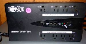 lot 34 image: Tripp Lite 550VA UPS Desktop Battery Back Up, 8 Outlet, 300W 120V Standby, Ultra-Compact