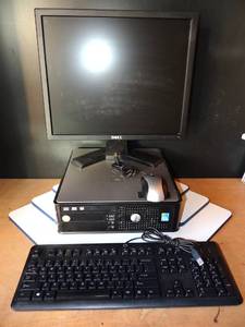 lot 228 image: DELL OPTIPLEX 780 DESKTOP COMPUTER W MONITOR, KEYBOARD. AND MOUSE