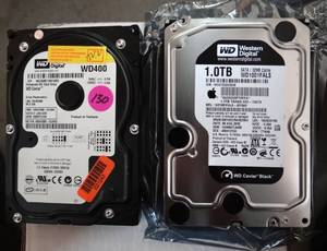 lot 130 image: Western Digital WD400 - 40GB 7.2K RPM IDE 3.5 Hard Disk Drive (HDD) & Western Digital WD1001FALS-40Y6A0 - 1TB 7.2K RPM SATA 3.5 Hard Drive HDD