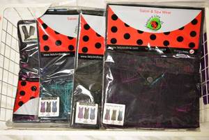 lot 102 image: Salon & Spa Wear Sparkling Apron, 12 Total