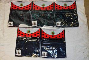 lot 224 image: Salon & Spa Wear Sparkling Aprons, 5 Total