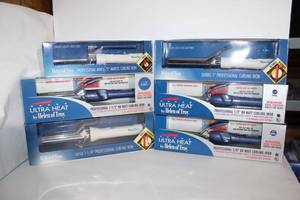 lot 29 image: Helen of Troy Curling Irons, see pictures for Sizes