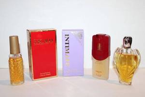 lot 702 image: Individual Perfume Bottles as shown