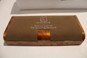 lot 384 image: Razorline Hairdressing Scissors Empty Cases, 8 Total