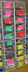 lot 556 image: Elfa Basket Storage Racks, 2 Racks each holds 10 Baskets CONTENTS SOLD SEPARATELY