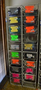 lot 566 image: Elfa Basket Storage Racks, 2 Racks each holds 10 Baskets CONTENTS SOLD SEPARATELY