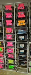 lot 569 image: Elfa Basket Storage Racks, 2 Racks each holds 10 Baskets CONTENTS SOLD SEPARATELY