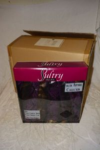 lot 652 image: Sultry Skins Plum Python Sets, (each includes 1 Apron, 1 Cape, and 1 Handbag), 1 Box