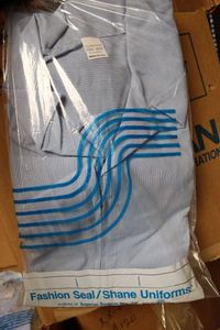 lot 599 image: Fashion SealShane Uniforms Pin Strip Shirts, Size XL, 3 Large Boxes Full