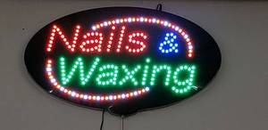 lot 413 image: Light Sign Nails & Waxing