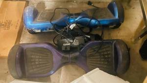 lot 96 image: 2 Hoverboard with Chargers (works, 1 shakes when not using)