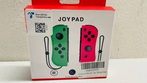 lot 130 image: Joy Con Joy Pad for Nintendo Switch GreenPink