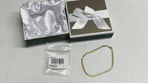 lot 155 image: Finejewelers 14k Stamped Yellow Gold 8in Length 2.4mm Width Beveled Curb Chain Bracelet 2.79grams