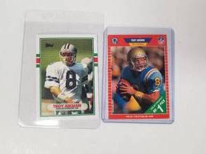 lot 134 image: Selection of 2 Troy Aikman - Rookie cards - 1989 Topps and Prosett