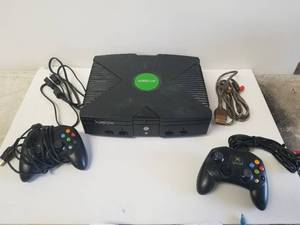 lot 56 image: XBox gaming system - came on when plugged in
