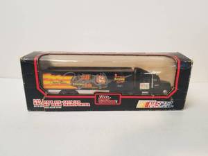 lot 48 image: Racing Champions 164 diecast car racing team transporter - Davey Allison - signed Bobby Allison - Authenticity unknown