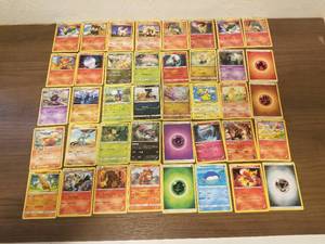 lot 75 image: Selection of 40 Pokemon cards