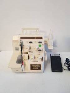 lot 141 image: Baby lock Solid State Precision Engineered sewing maching
