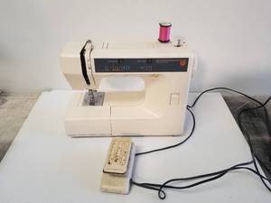 lot 155 image: Kenmore Sewing Machine
