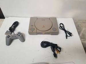 lot 32 image: Sony Playstation - came on when tested