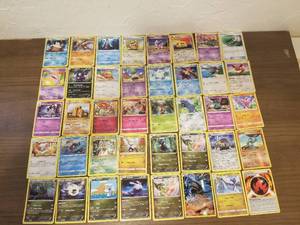 lot 37 image: Selection of  40 Pokemon cards