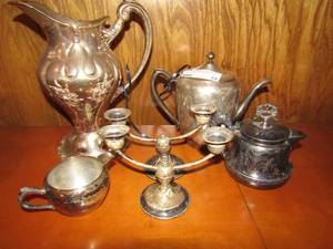 lot 18 image: Amsterdam triple plate silver #14 creamer, Taulton silver #2311 , Dirby silver quadruple plate 88500 #204 vase and two double tier candle sticks