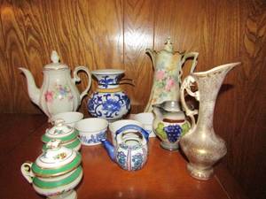 lot 22 image: Lot- 9 tea pot made in Germany, Blue pottery vase, 4 Rhapsody yogurt bowls,   R&S Russian tea pot,   2 mini green teapots and mini Ben Picket teapot