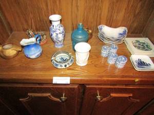 lot 31 image: 2 Royal Copenhagen 985 Arabia firland saucer in box, 4 mini blue glass,  Royal Doulton ashtray, Oklahoma city sovenier Cowboy hall of fame mini creamer and 5 blue and white china dishs