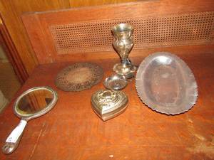 lot 57 image: Silver hand mirror,  Silver platter oval and heart hot pad holder