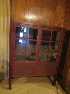 lot 62 image: Mid Century Modern Wood w Wicker inserts  3 shelf wood display case on wheels 61x46x16  matches 4, 48, 118