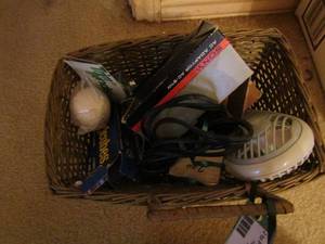lot 75 image: Basket of misc.- fan, batteries, clock, etc.