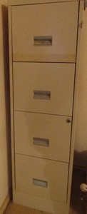 lot 92 image: 4 drawer filing cabinet. No key but it is unlocked