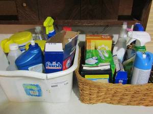 lot 120 image: White tub and wicker basket full of household cleaning supplies