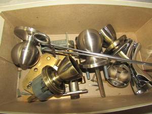 lot 124 image: Box of assorted door knobs