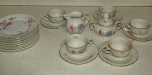 lot 128 image: 7 Rone Germany Rose design dessert plates 5 IJB German cups and saucers plus cream and sugar