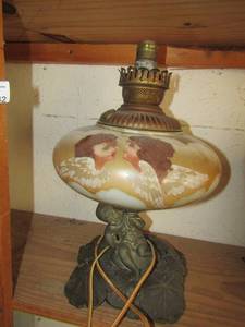 lot 142 image: Victorian lady lamp with glass globe with 2 angels
