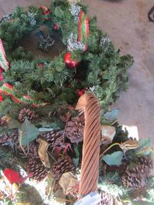 lot 155 image: Large wicker basket with greenery and pinecones wrap around wreath