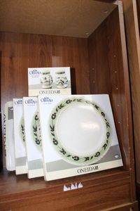 lot 57 image: Oneida Oliveto Dinner Plates (4 Total) and Salt and Pepper Shakers