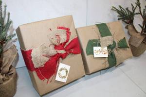 lot 173 image: Christmas Decorations Burlap Ribbon Packages and a Pair of Pine Trees
