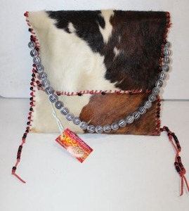 lot 225 image: Cowhide Purse still with Tags - Made by Curves of Steel