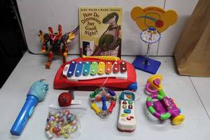 lot 244 image: Toy Gift Lot Sulley Flashlight, V-Tech Phone, Little Tikes Xylophone and More