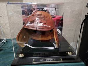 lot 1 image: JIM BROWN AUTOGRAPHED LEATHER HELMET OUT OF $1.6M HOME