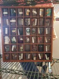lot 107 image: Selection of shot glasses in display