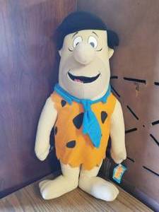 lot 129 image: Fred Flintstone stuffed toy - stands 26 inches
