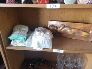 lot 173 image: Selection of baby clothes, blankets and a plaque called Infant by Ferrari