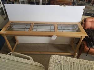 lot 276 image: Blonde glass top sofa table